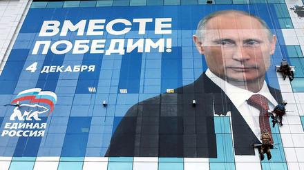 So sieht er sich gerne: Putin auf einem aktuellen Wahlwerbeposter.