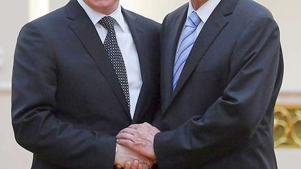 Lieber mit China als mit der Nato: Wladimir Putin traf unter anderem mit dem Vorsitzenden des Nationalen Volkskongressesn, Wu Bangguo, zusammen.