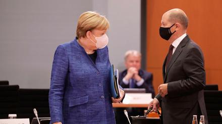 Angela Merkel und Olaf Scholz im Kabinett.