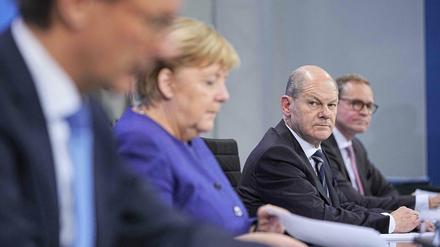 Angela Merkel stellt auf einer Pressekonferenz die neuen Corona-Maßnahmen vor.