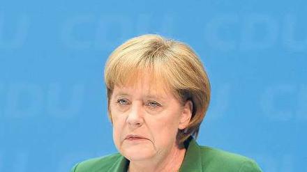 Erklärungsbedarf. Merkel stellte die CDU- Basis aber nicht ganz zufrieden. Foto: ddp