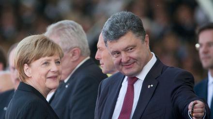 Bundeskanzlerin Angela Merkel und der ukrainische Staatschef Petro Poroschenko in der Normandie