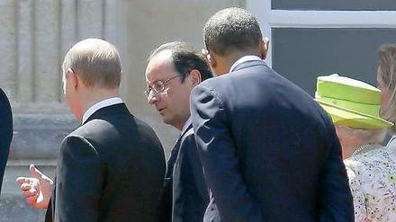 Dicht beisammen. Russlands Präsident Putin, Frankreichs Staatschef Hollande, US-Präsident Obama und die britische Königin Elizabeth II. (v.l.n.r.)