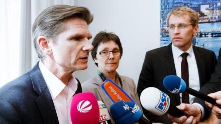Die Grüne Monika Heinold zusammen mit den Landesvorsitzenden Heiner Garg (FDP, links) und Daniel Günther (CDU). 