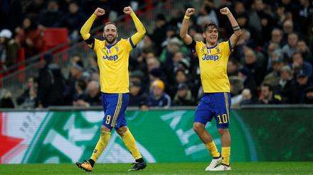Kaum zu glauben. Gonzalo Higuain (l.) und Paulo Dybala stehen mit Juventus im Viertelfinale der Champions League.