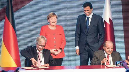 Paten gestanden. Angela Merkel und Tamim bin Hamad Al-Thani. 
