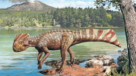 Die Illustration zeigt einen Dinosaurier, der am Ufer eines Sees oder Flusses steht.
